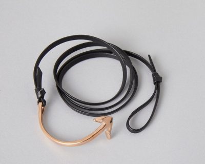 ZLCOPENHAGEN Black Leather Rosa Gold Anchor Bracelet showcasing a blend of luxury and resilience with eco-friendly design