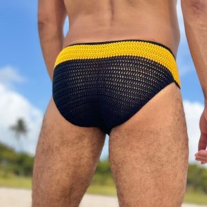 Handmade custom crocheted men's swimwear by ZLCOPENHAGEN, showcasing intricate Danish design, tailored for a perfect fit